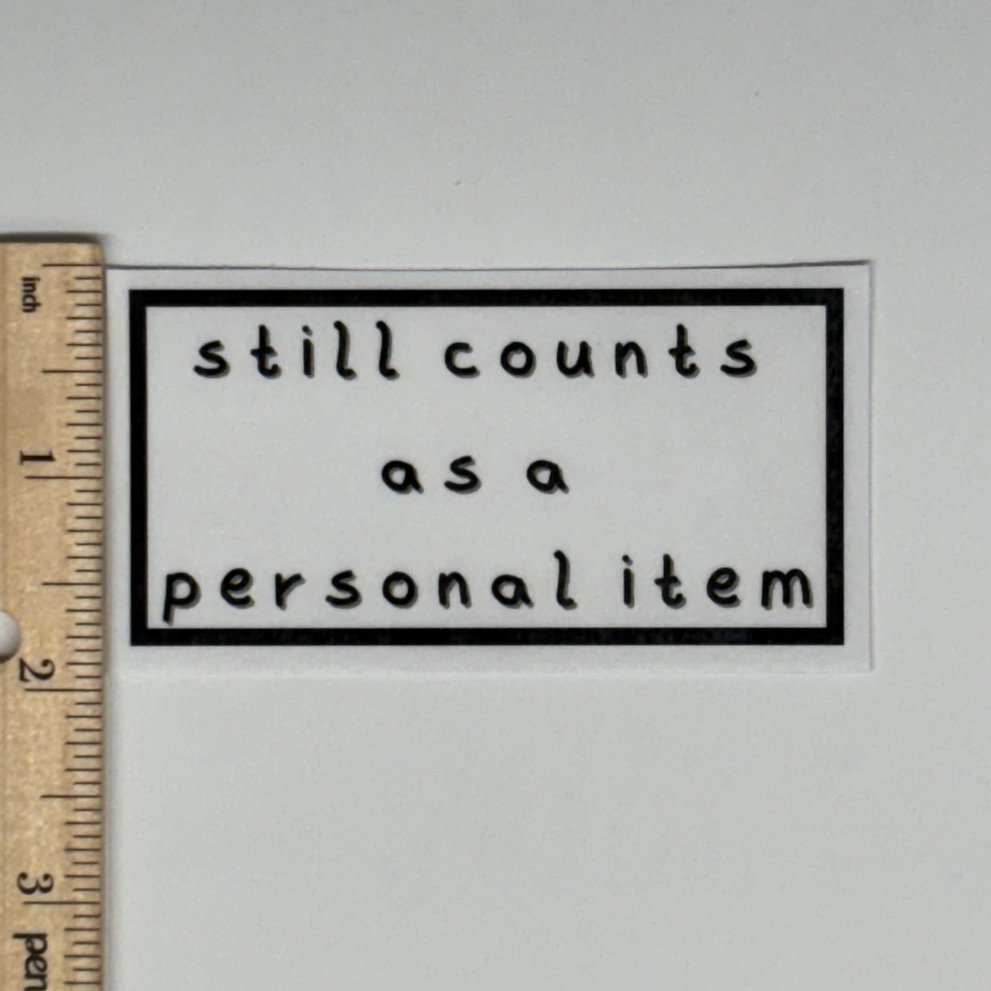 still counts as a personal item sticker
