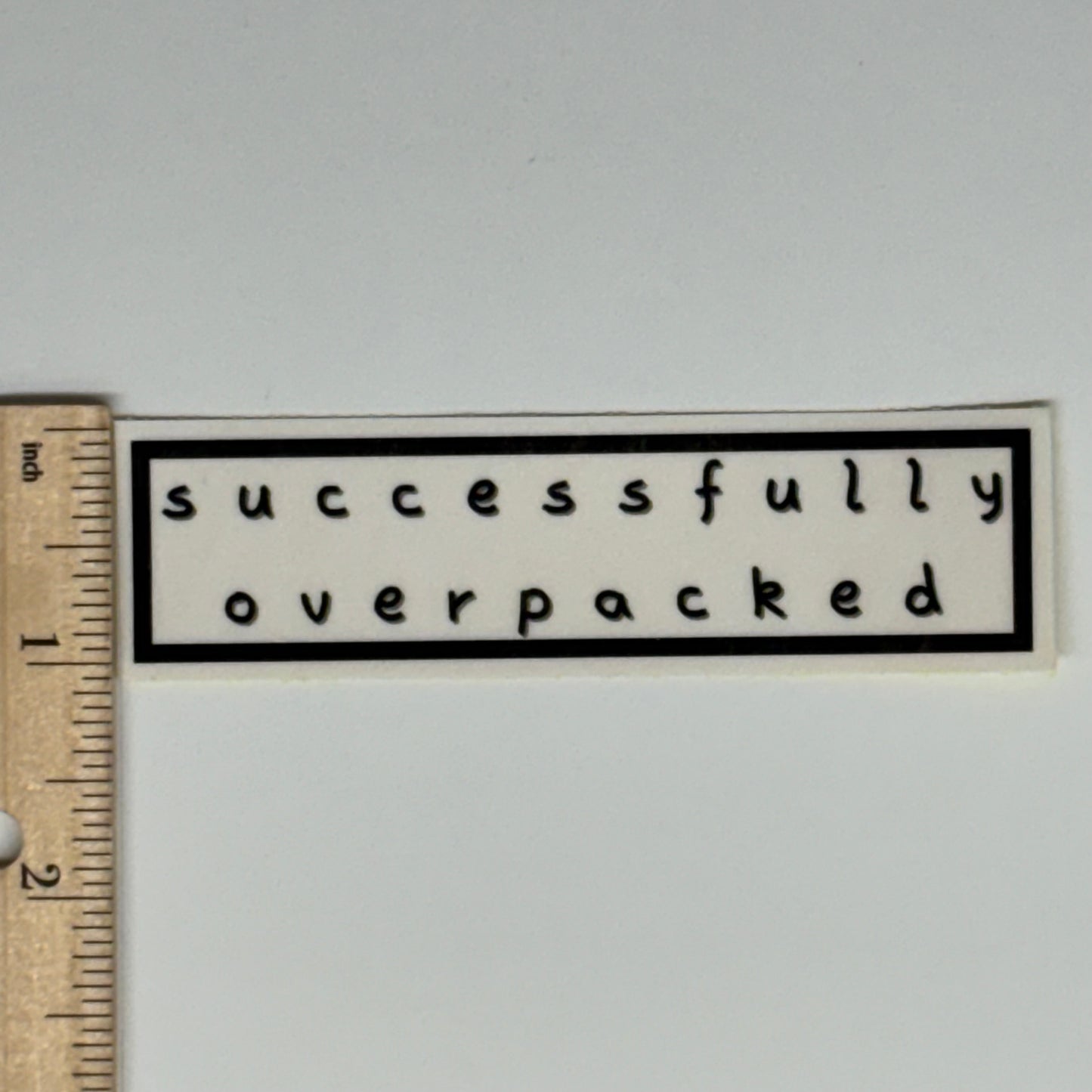 successfully overpacked sticker