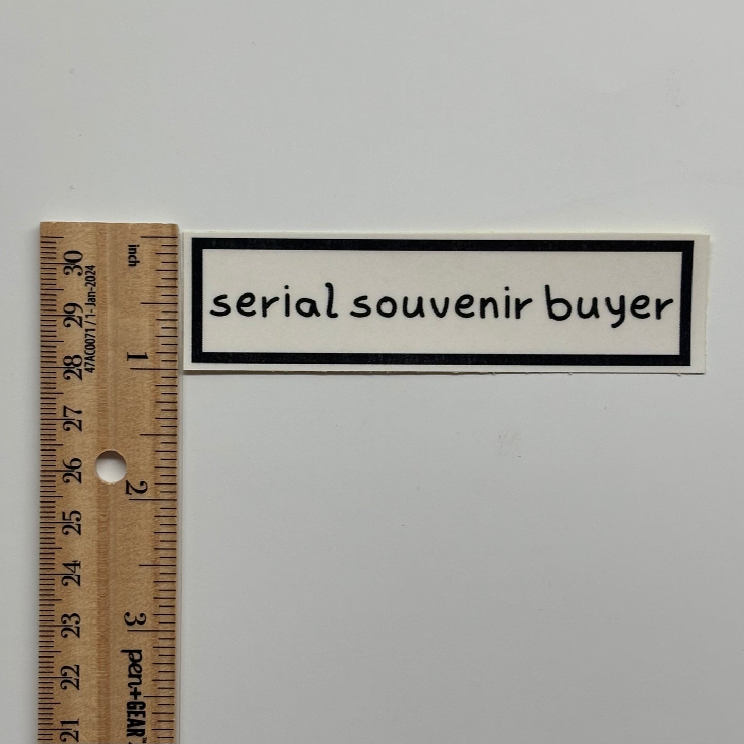 serial souvenir buyer sticker