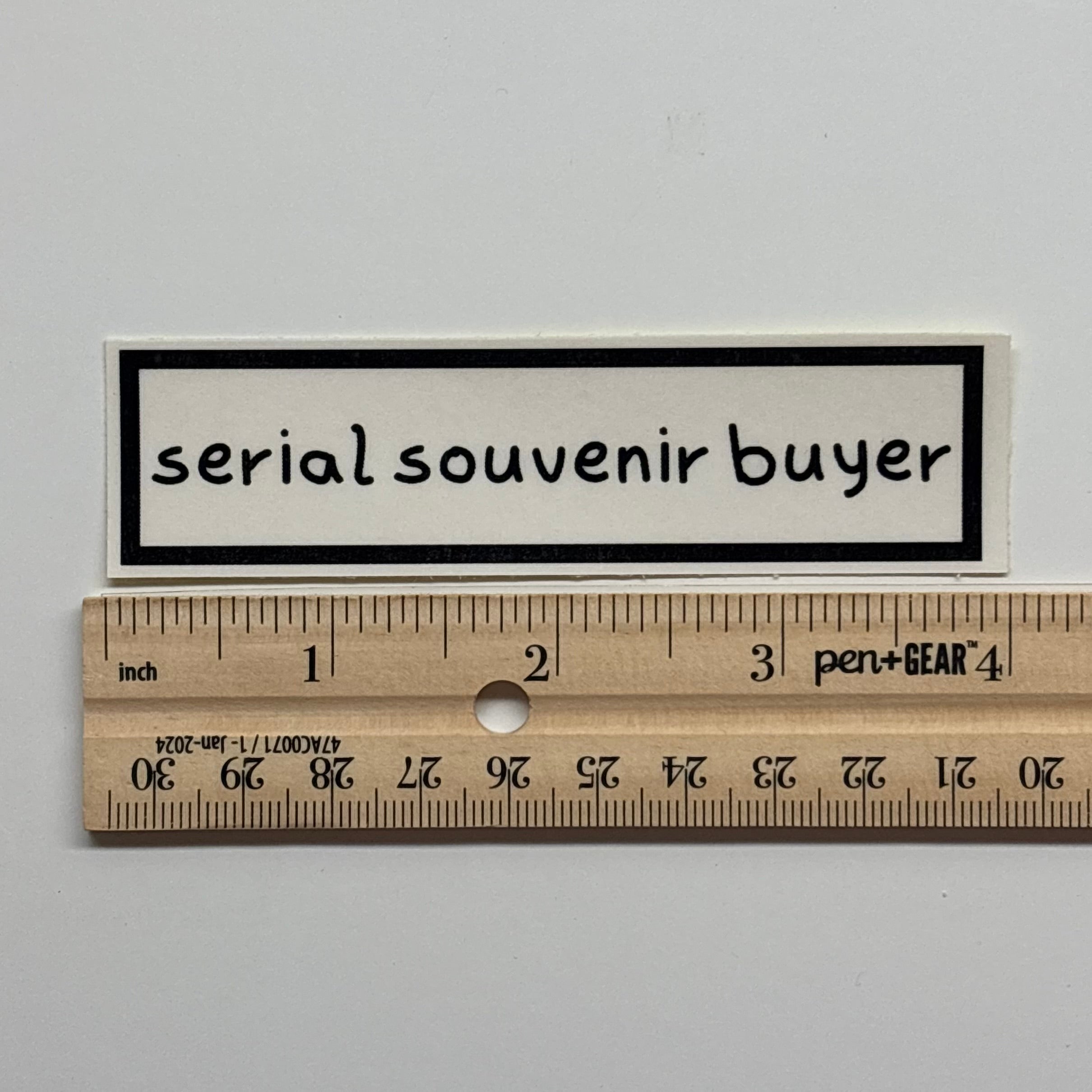 serial souvenir buyer sticker