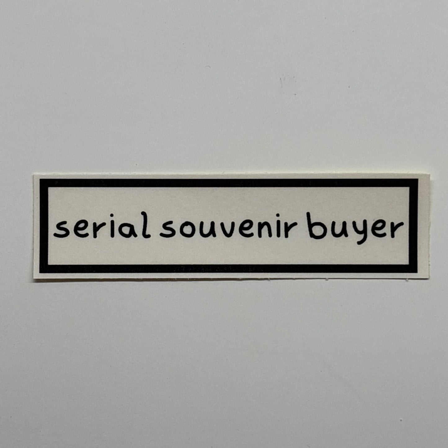 serial souvenir buyer sticker