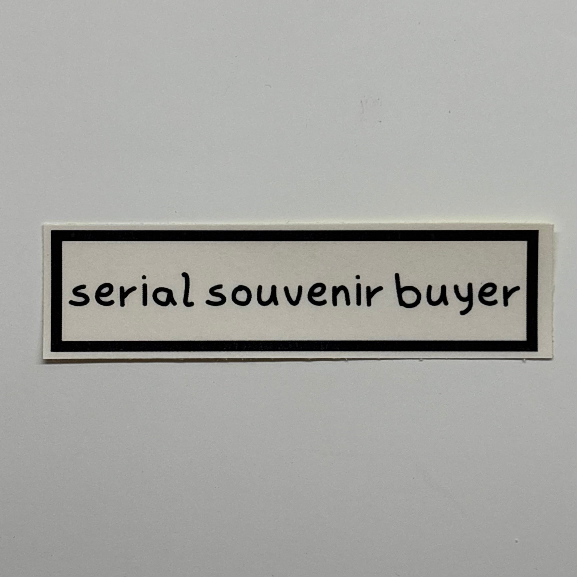 serial souvenir buyer sticker