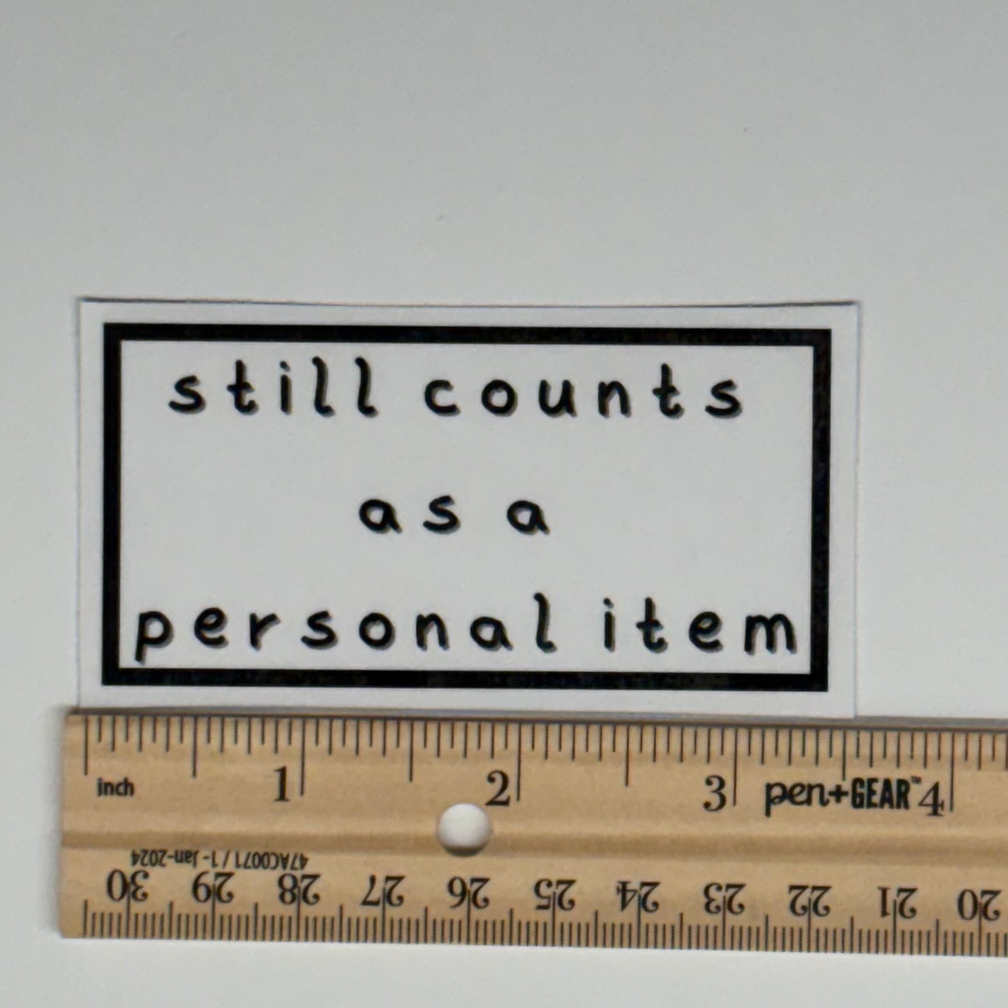 still counts as a personal item sticker