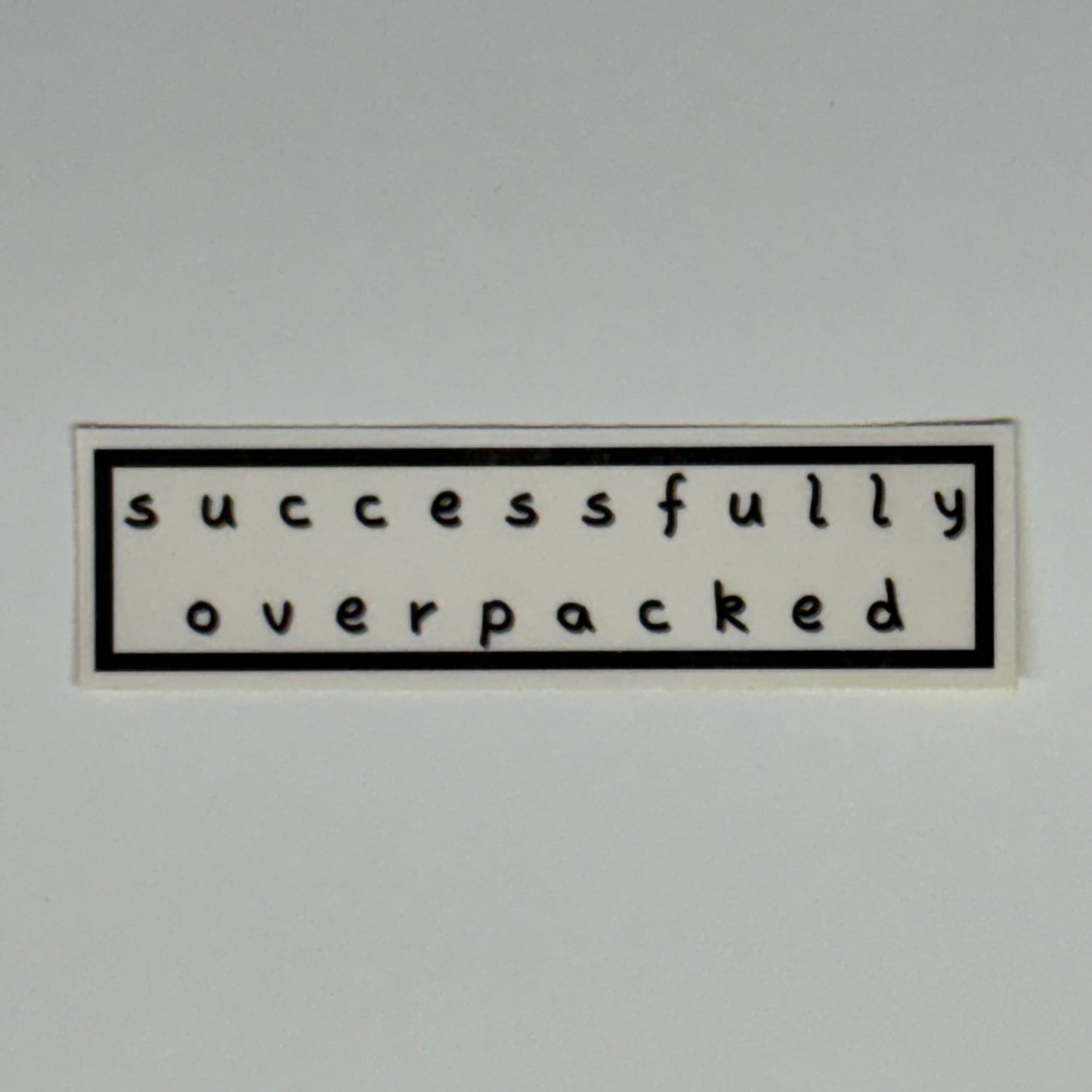 successfully overpacked sticker