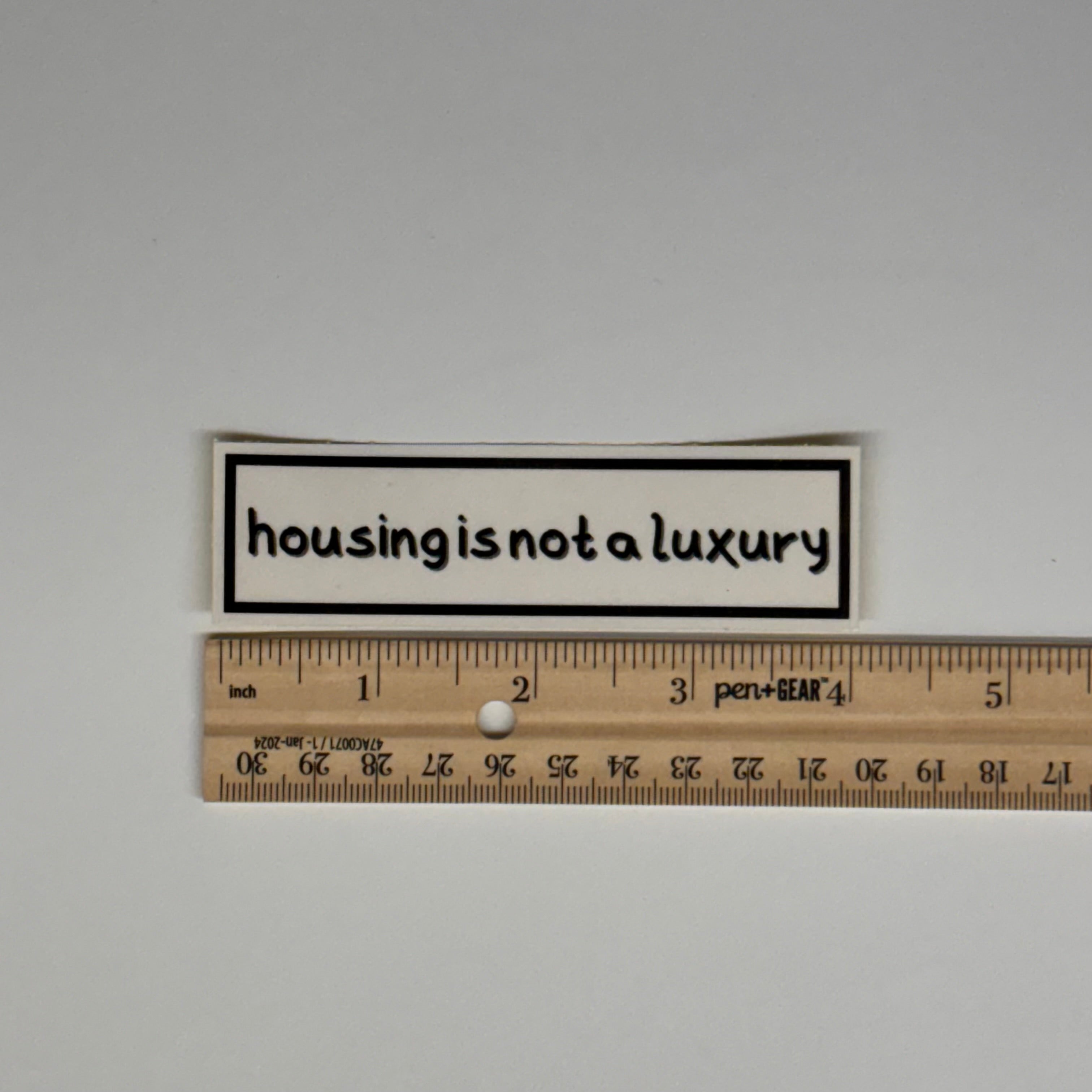 housing is not a luxury sticker