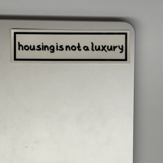 housing is not a luxury sticker