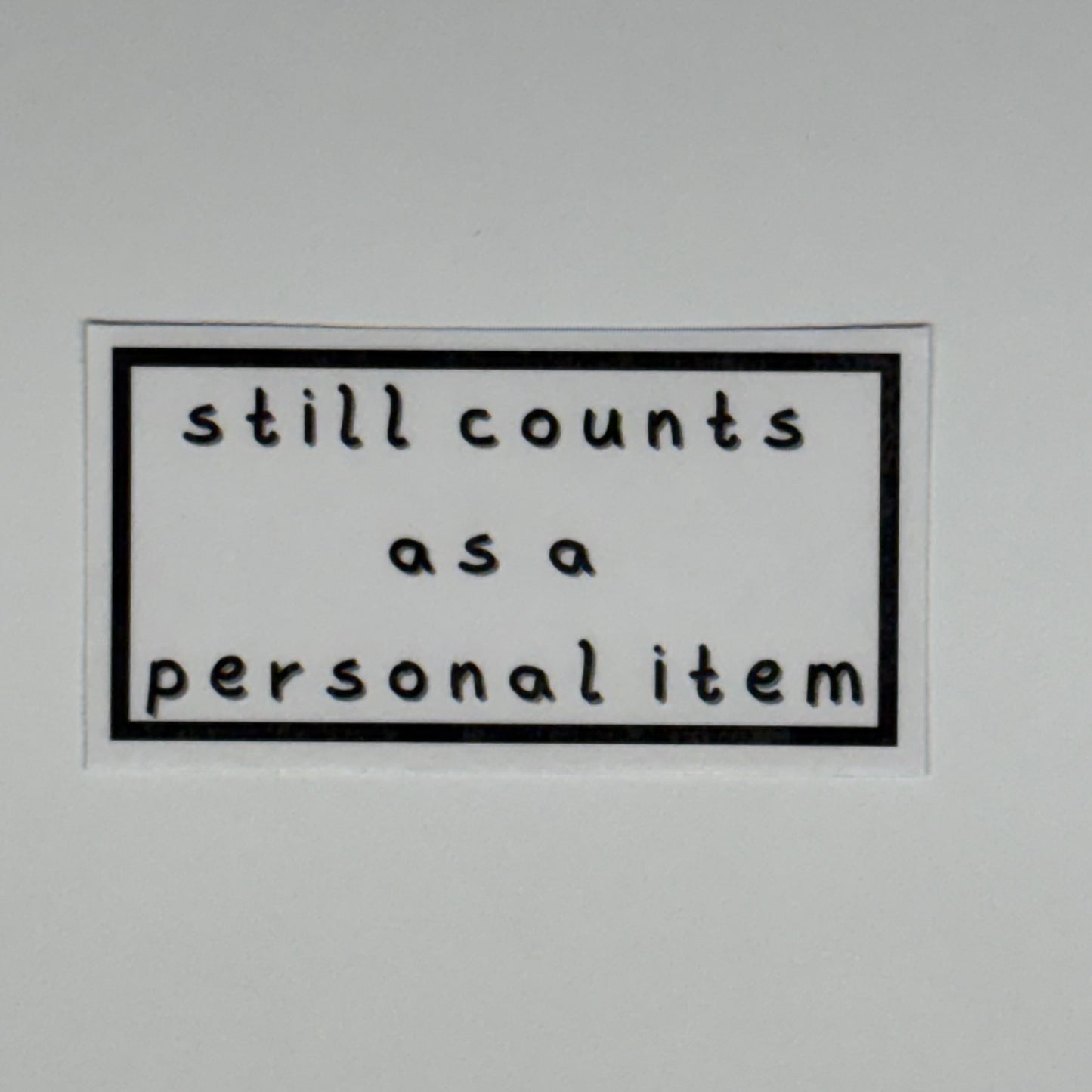 still counts as a personal item sticker