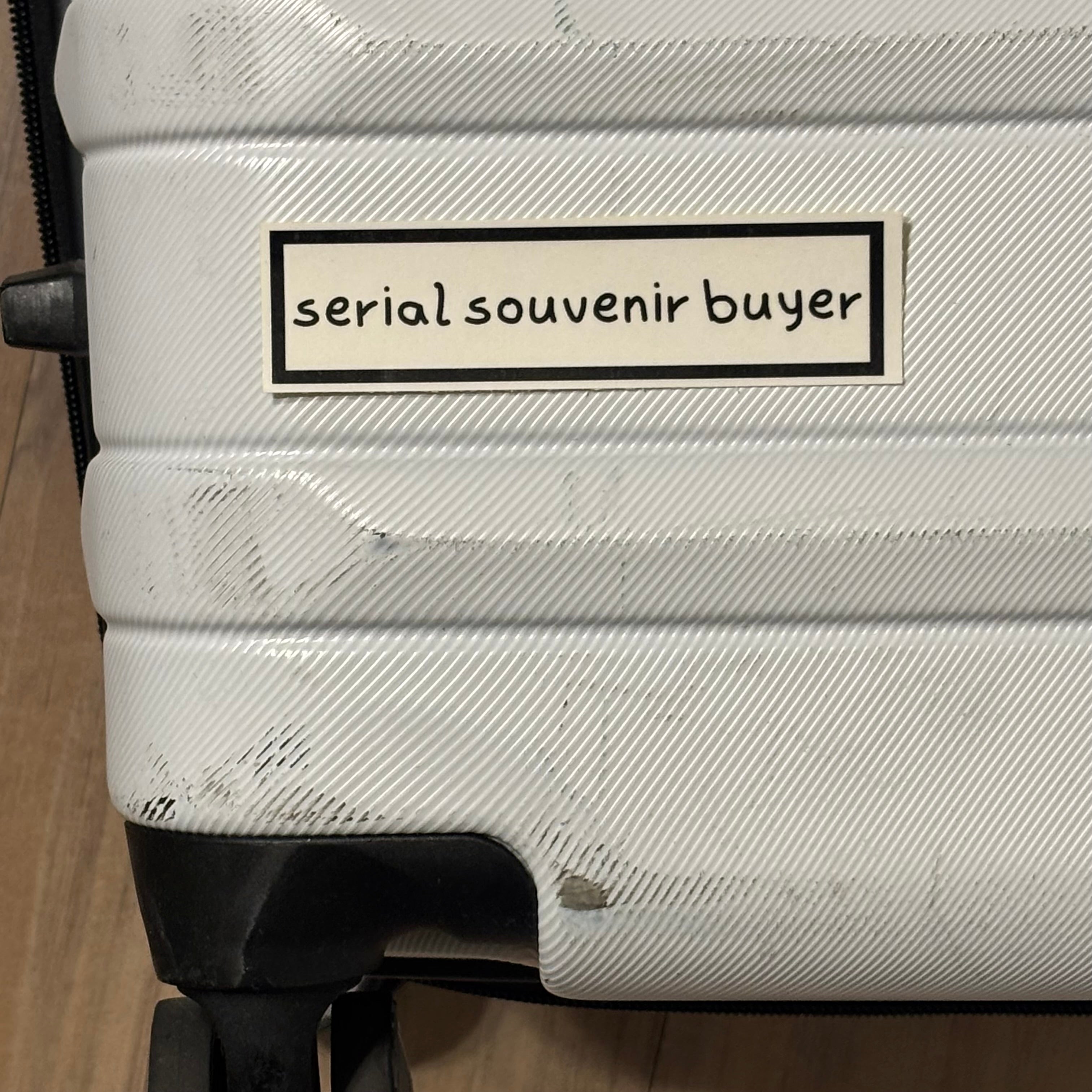 serial souvenir buyer sticker