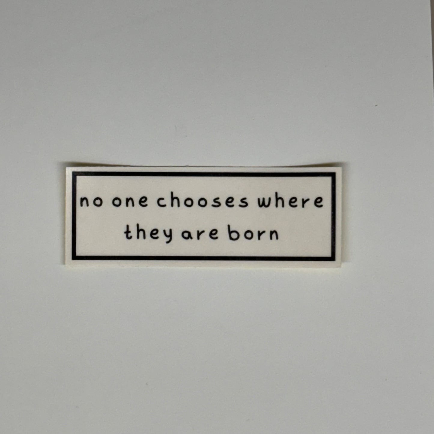 no one chooses where they are born sticker
