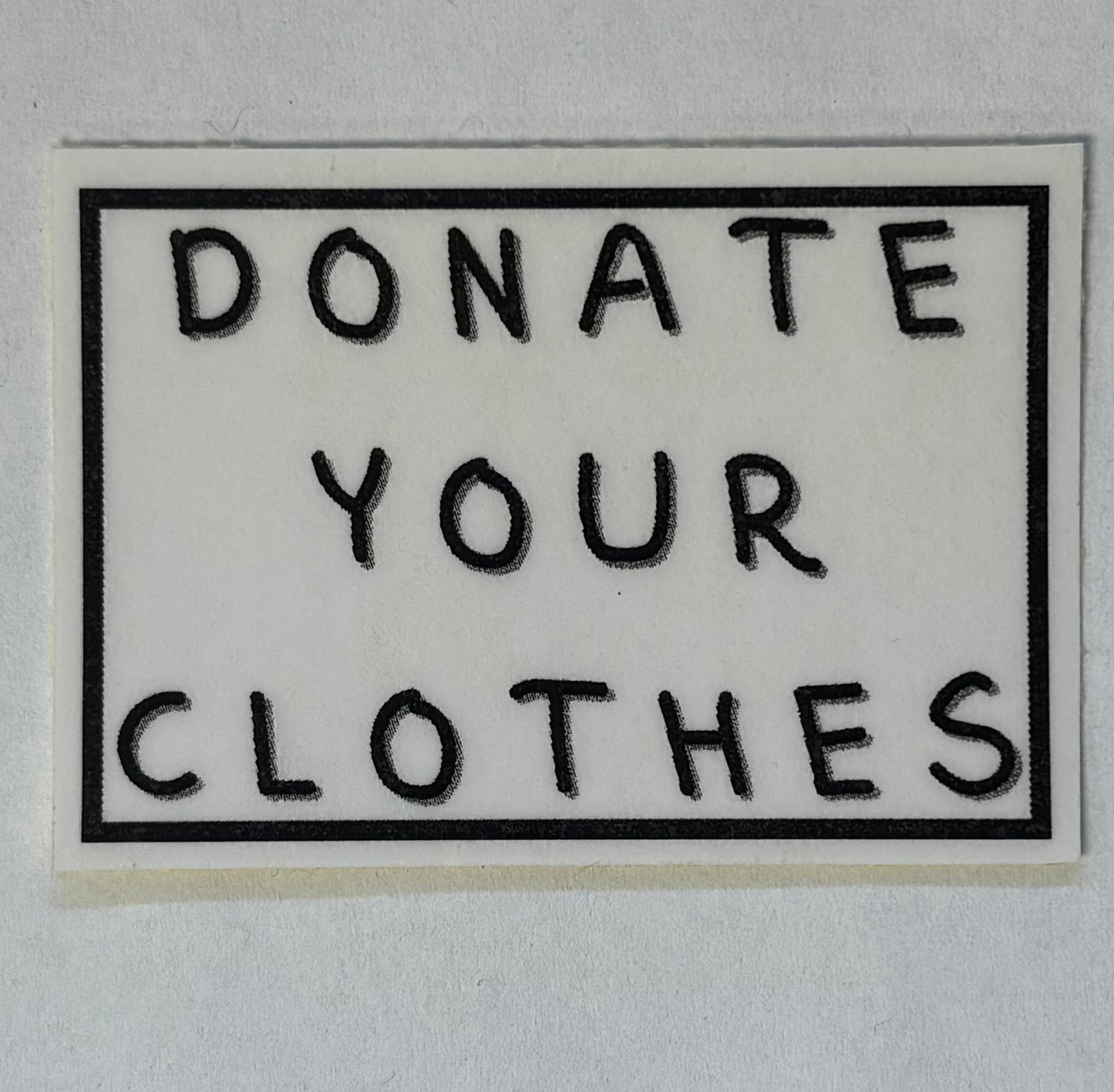 donate your clothes sticker
